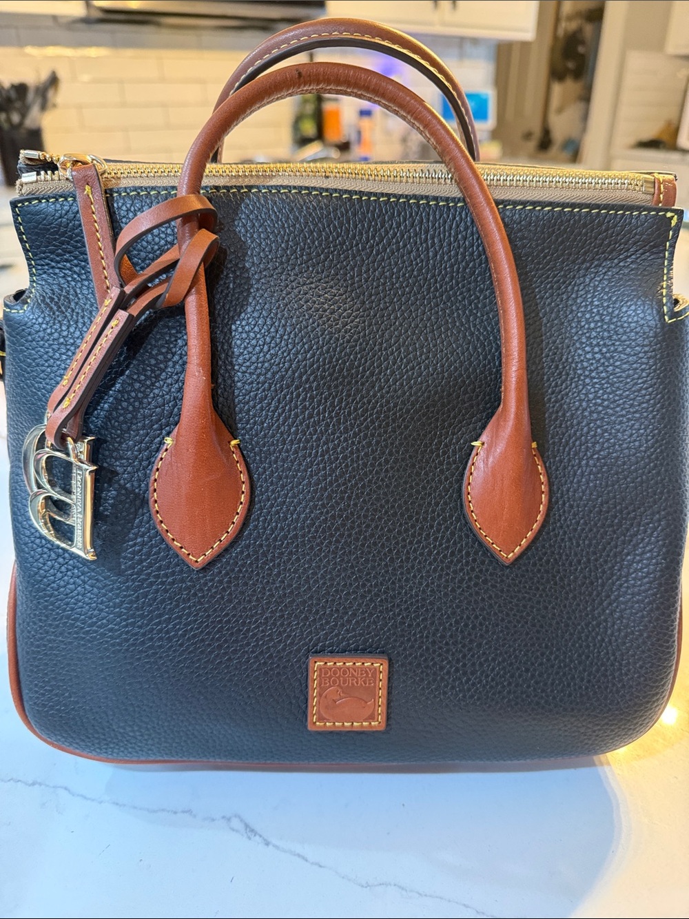 Dooney & Bourke Black Pebble Leather Satchel with Brown Trim